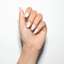 hands wearing Sheek White Polish 15ml by Morgan Taylor