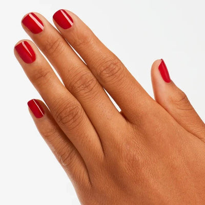 hands wearing A69 Red Hot Rio Intelli-Gel Polish by OPI