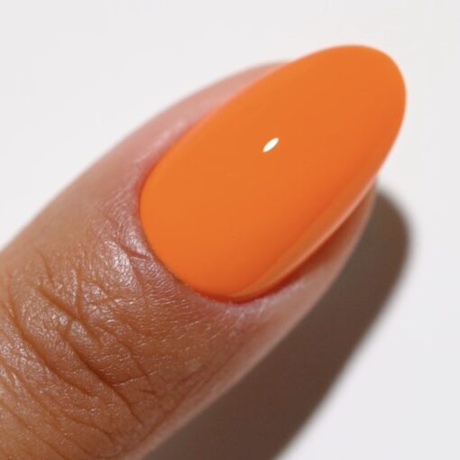 Finger wearing 2539 Citrus Affairs Gel & Polish Duo by DND DC