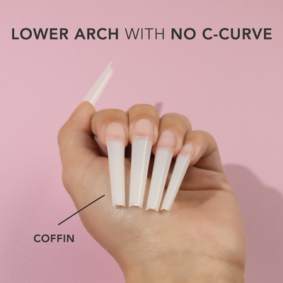 Hands wearing Natural Coffin Non C-Curve Tips XXL by Kiara Sky