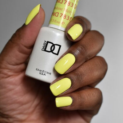 Hands wearing 783 Melty Sunshine Trio by DND