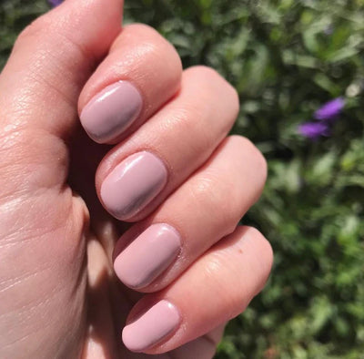 hands wearing DND 606 London Coach Gel & Polish Duo