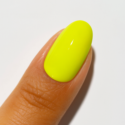 finger wearing DND DC Gel Polish - Shine Bright