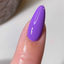 finger wearing DND DC Gel - 260 Electric Purple