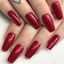 hand color swatch for DND Gel Polish 522 Pomegranate