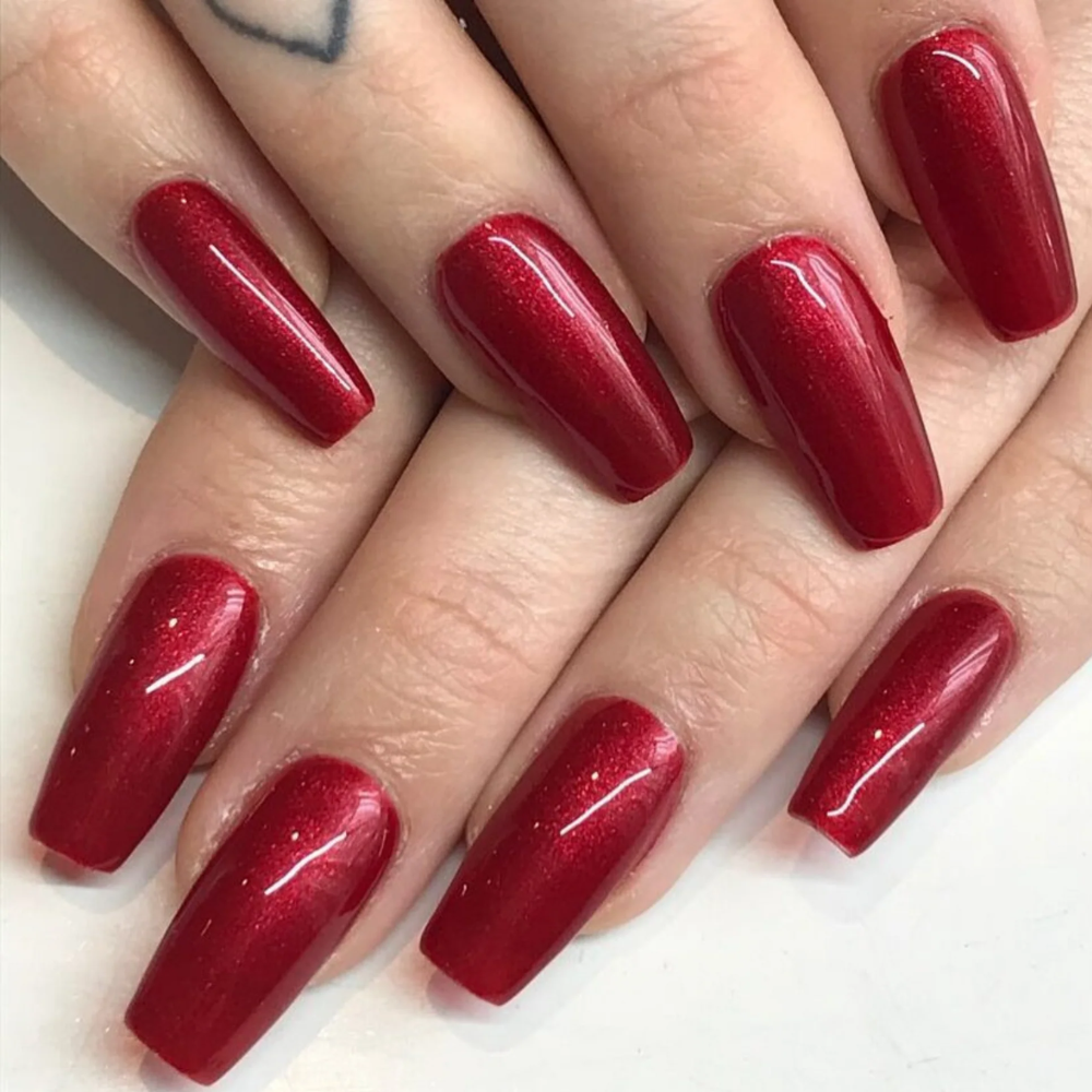 hand color swatch for DND Gel Polish 522 Pomegranate