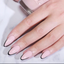 hands wearing DND DC Gel - 141 Pink Champagne