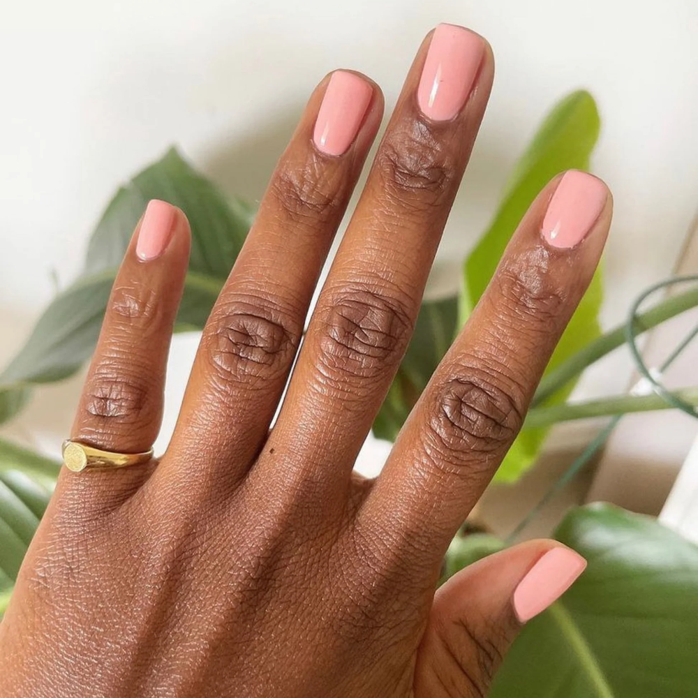 hands wearing DND DC Gel - 143 Banana Crepe