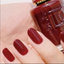 hands wearing DND DC Gel - 162 Clear Red