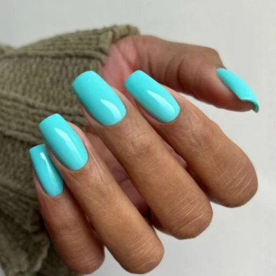 hands wearing DND DC Gel 126 Beautiful Teal