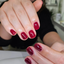 hands wearing DND Gel and Polish duo 701 Wanna Wine