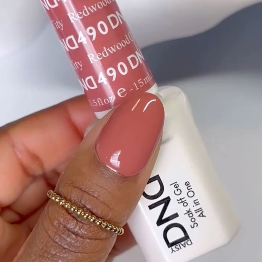 finger wearing DND Gel Polish - 490 Redwood City