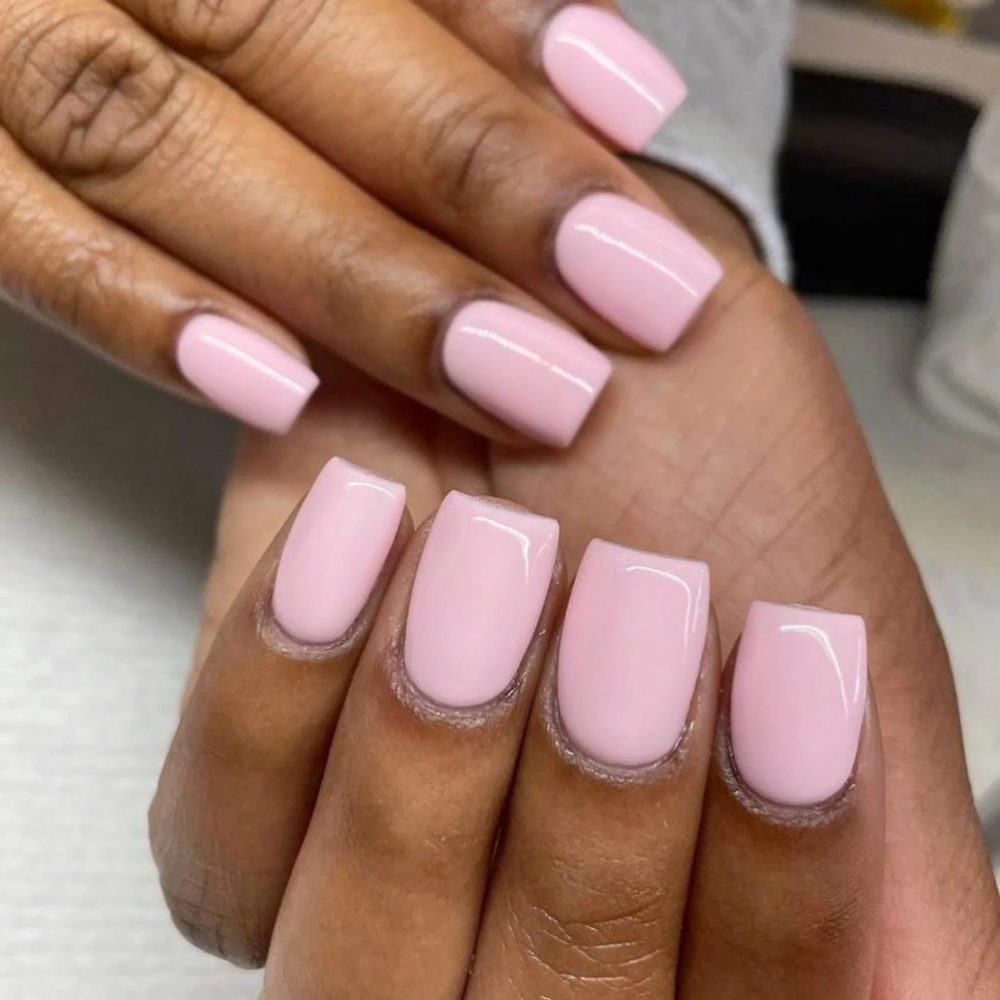 hands wearing DND Gel Polish 550 Coral Castle, FL