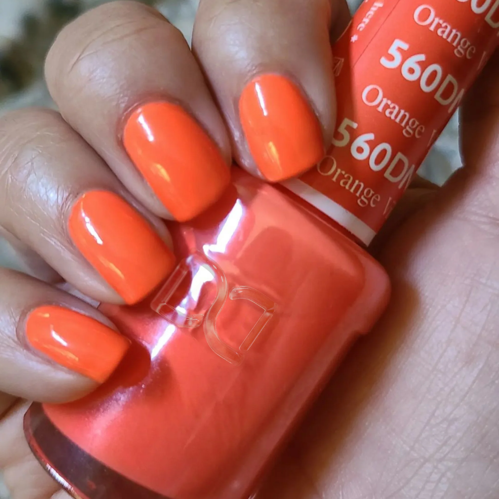 hands wearing DND Gel Polish - 560 Orange Ville, Ut