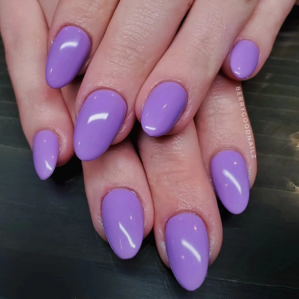 hands wearing DND Gel Polish 573 Lavender Blue