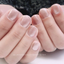hands wearing DND Gel Polish 709 Georgia Peach