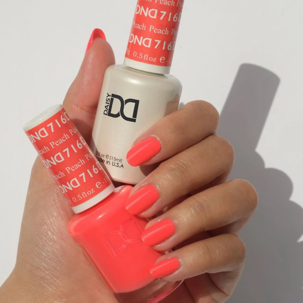 hands wearing DND Gel Polish - 716 Peach