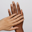 hands wearing DND Gel Polish - 980 Boogie On Brown