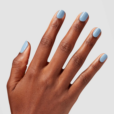 hands wearing OPI Intelli-Gel Duo - F036 Baggy Jean Baby