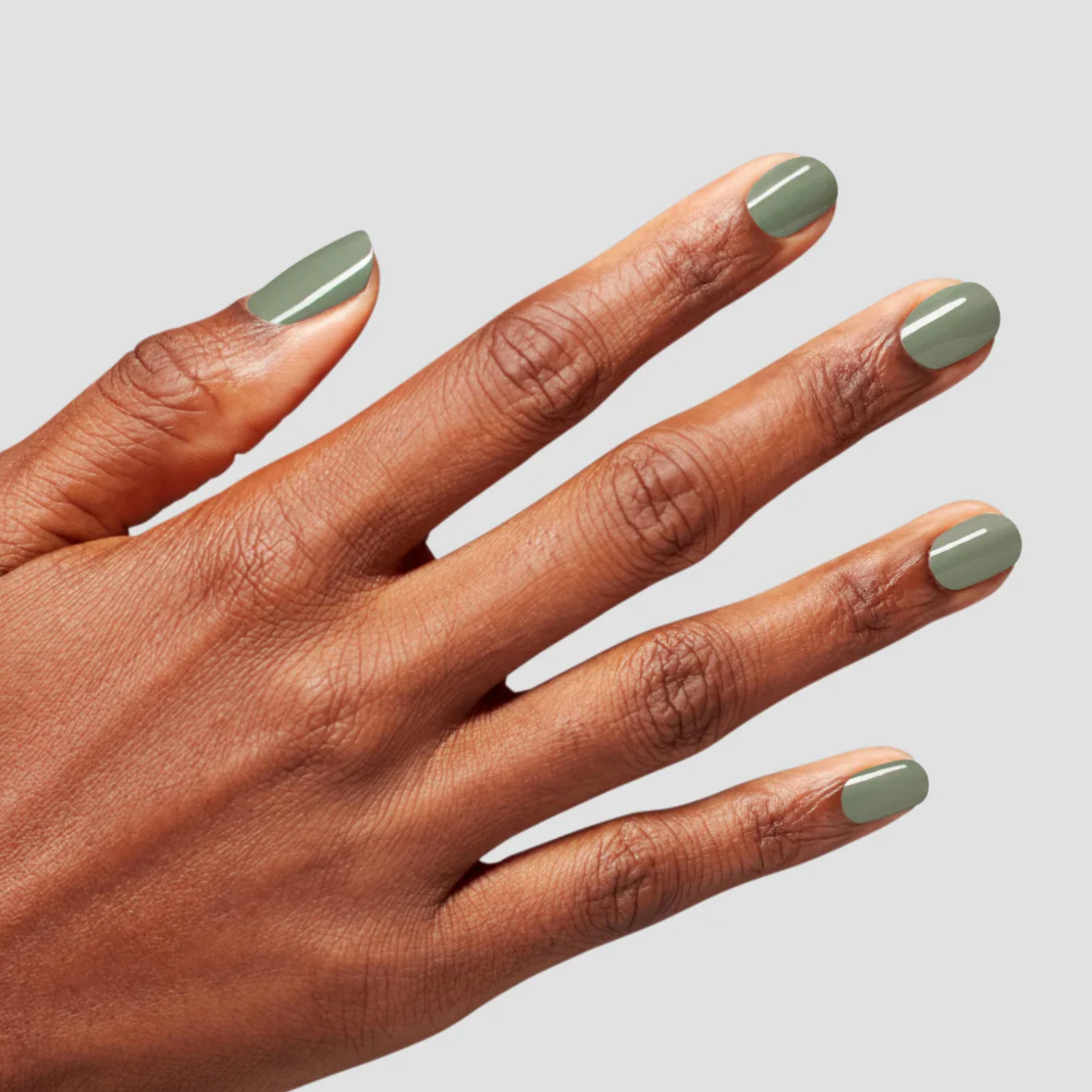 hands wearing OPI Intelli-Gel Duo - F029 Cargo All Out