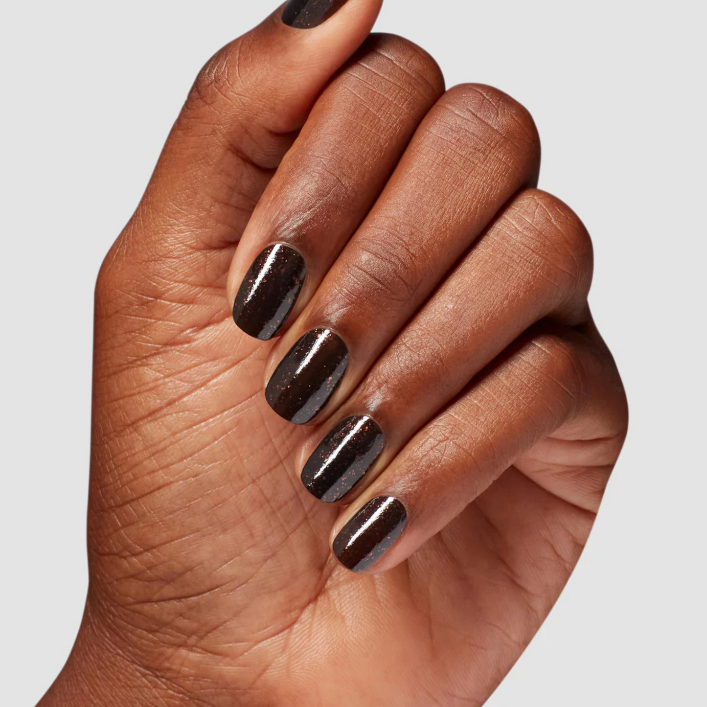 hands wearing OPI Intelli-Gel Duo - F035 Grunge Queen