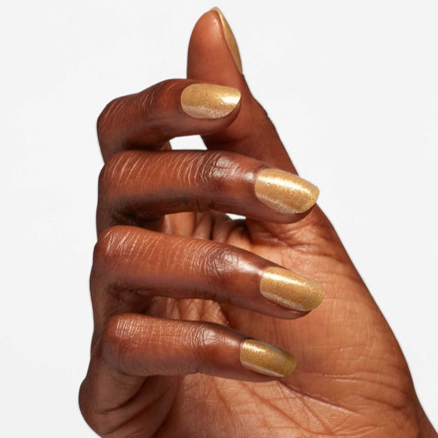 HAnds wearing Q16 Five Golden Flings Infinite Shine by OPI