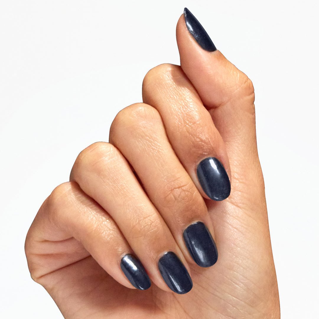 hands wearing F009 Midnight Mantra Intelli-Gel by OPI