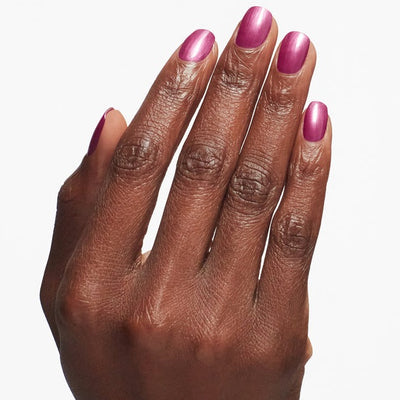 Hands Wearing Powerful Pink Nail Envy Tri-Flex 0.5oz by OPI