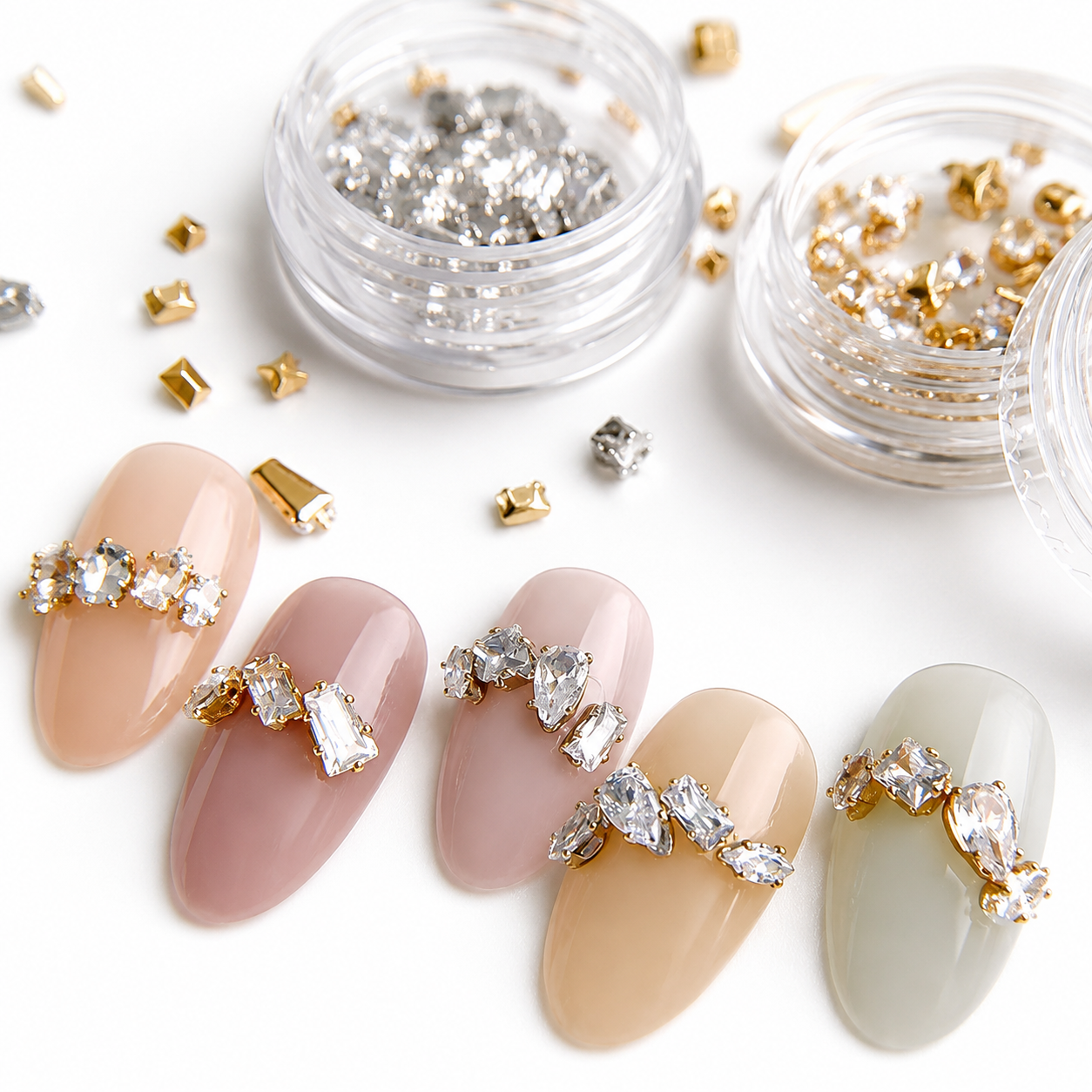 Mixed-shape clear nail crystals with gold frames for luxury nail art, Gel-X, builder gel, and acrylic manicures.