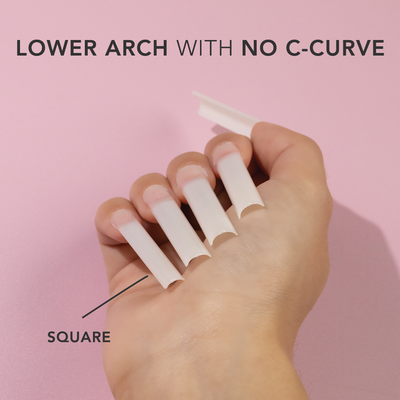 Hands wearing Natural Square Non C-Curve Tips XXL by Kiara Sky