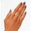 hands wearing W60 Squeaker Of The House Nail Lacquer by OPI