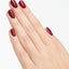 hands wearing W64 We The Female Nail Lacquer by OPI