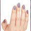 hands wearing MI10 Addio Bad Nails, Ciao Great Nails Nail Lacquer by OPI