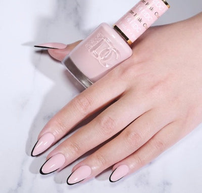 Hands Wearing 141 Pink Champagne Duo By DND DC