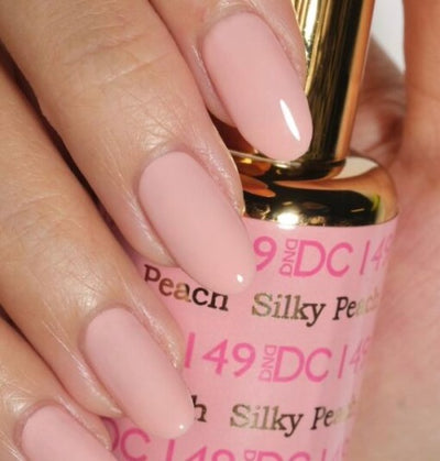 Hands Wearing 149 Silky Peach Duo By DND DC