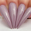 Hands wearing 509 Warm Lavender Gel Polish by Kiara Sky