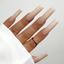 Hands wearing D5114 Running Late All-in-One Powder by Kiara Sky