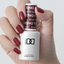 hands wearing 752 Winter Wine Trio by DND