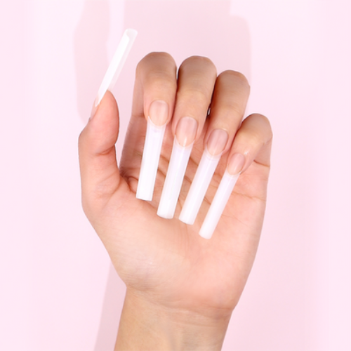 Hands Wearing Square C-Curve Tips XXL Natural By Kiara Sky