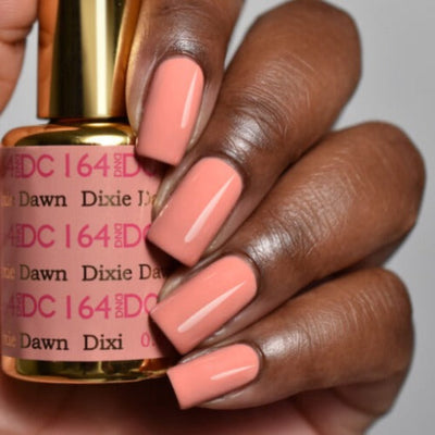 hands wearing DND DC Gel - 164 Dixie Dawn
