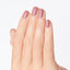 hands wearing H001 Suzi Calls The Paparazzi Nail Lacquer by OPI