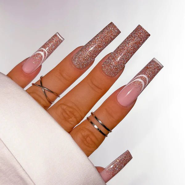 Hands wearing AFX12 Peach For The Stars DiamondFX Glitter Powder by Kiara Sky