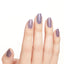 hands wearing MI10 Addio Bad Nails, Ciao Great Nails Gel Polish by OPI