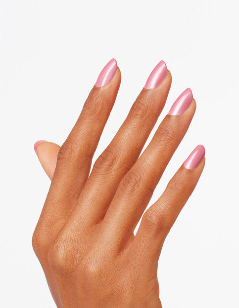 hands wearing G01 Aphrodite Pink Nightie Gel Polish by OPI