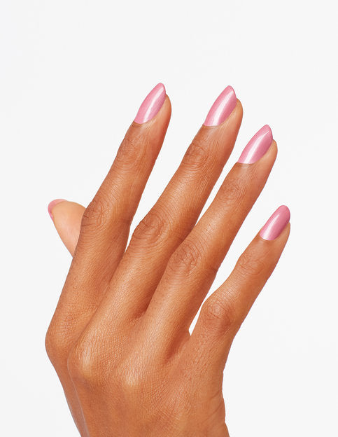 hands wearing G01 Aphrodite Pink Nightie Nail Lacquer by OPI