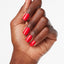 hands wearing C13 Coca Cola Red Nail Lacquer by OPI