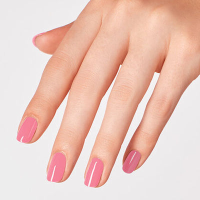 hands wearing D52 Racing For Pinks Gel Polish by OPI
