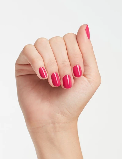 hands wearing E44 Pink Flamenco Gel Polish by OPI