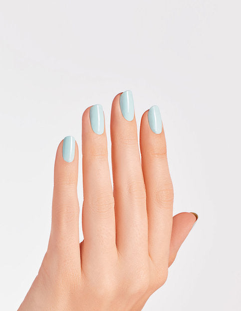 hands wearing M83 Mexico City Move-mint Nail Lacquer by OPI