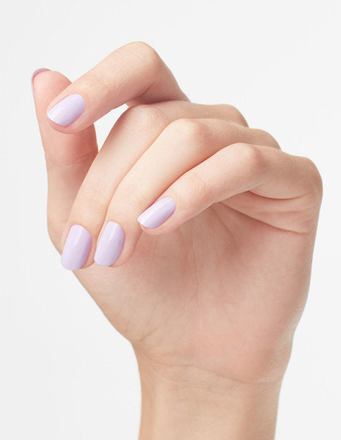 hands wearing F83 Polly Want a Lacquer Gel & Polish Duo by OPI